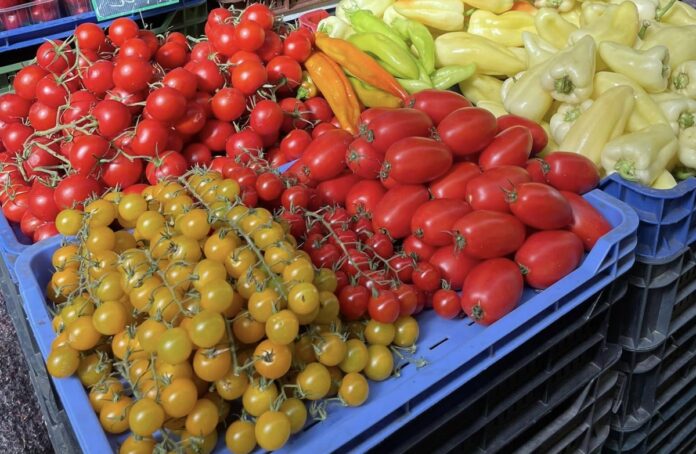 Bit Pazar Skopje: produce stalls piled with peppers and tomatoes