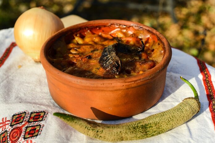 Traditional Macedonian restaurants in Skopje serving tavče gravče in a clay pot